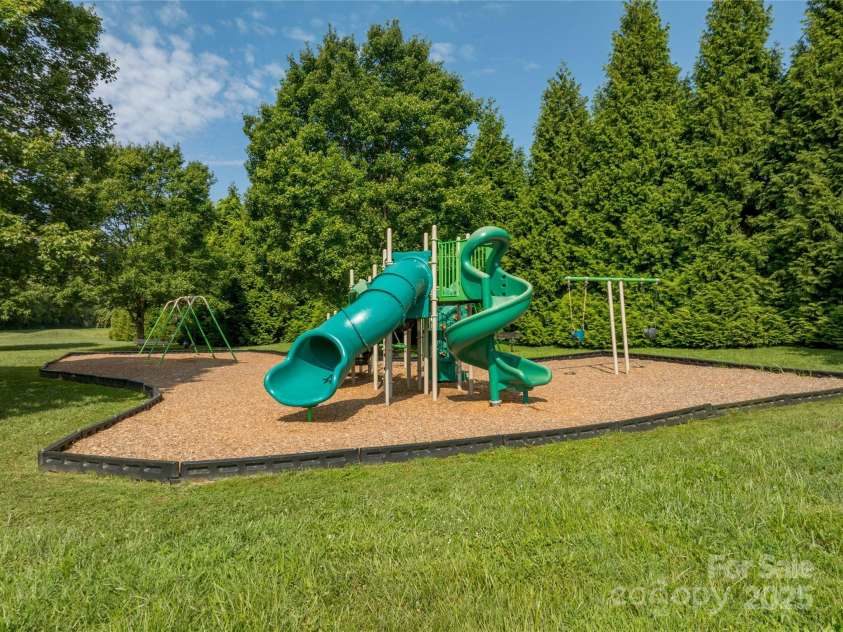34 Dove Hollow Road, Fletcher, NC 28732.  MLS# CAR4279098, YatesRealty ID 27596. Community Playground