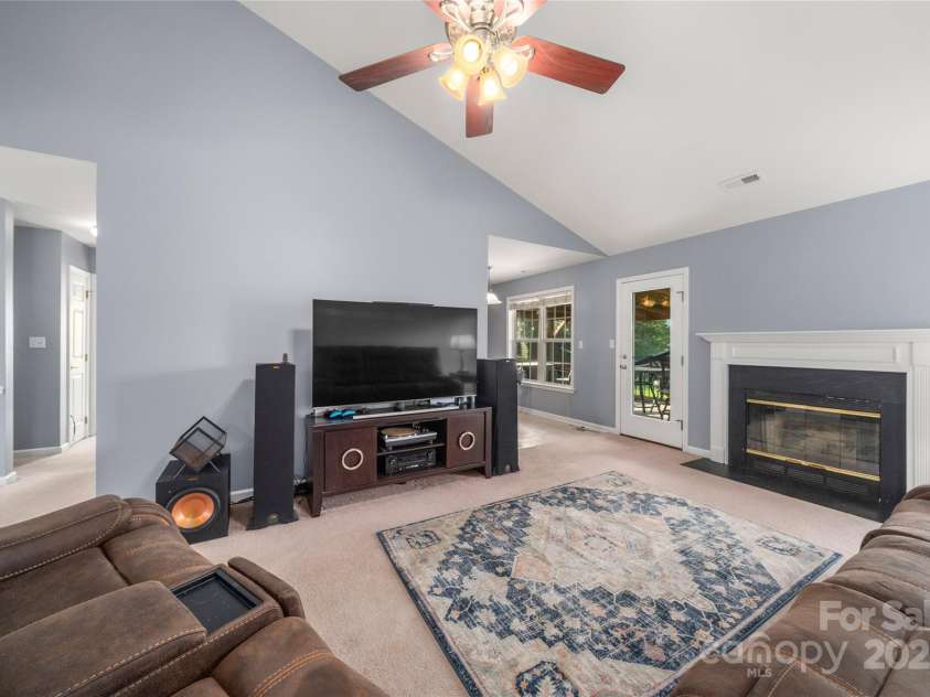 34 Dove Hollow Road, Fletcher, NC 28732.  MLS# CAR4279098, YatesRealty ID 27596. Faimly Room open space