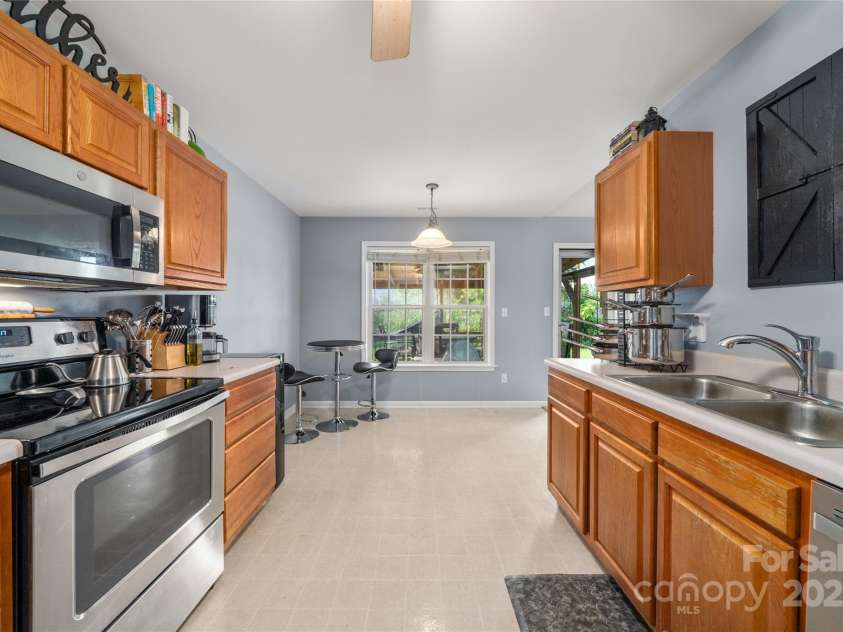 34 Dove Hollow Road, Fletcher, NC 28732.  MLS# CAR4279098, YatesRealty ID 27596. Kitchen with space for a kitchen table