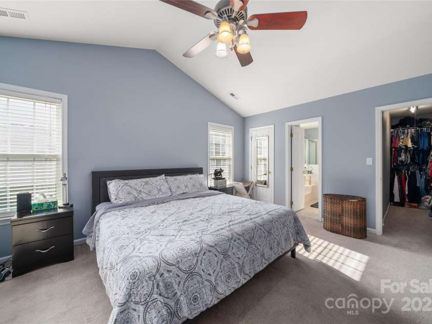 34 Dove Hollow Road, Fletcher, NC 28732.  MLS# CAR4279098, YatesRealty ID 27596. Primary bedroom ensuite with walk-in closet