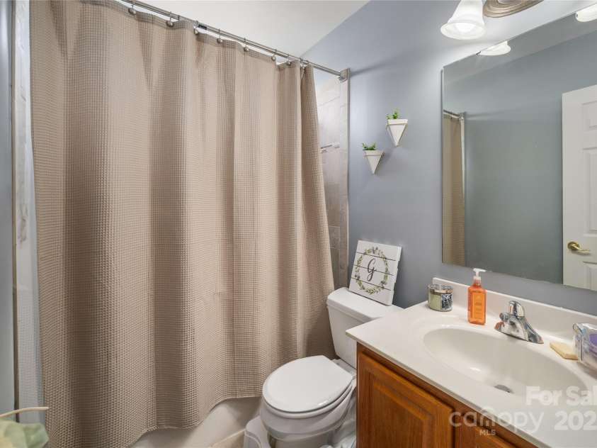 34 Dove Hollow Road, Fletcher, NC 28732.  MLS# CAR4279098, YatesRealty ID 27596. Second Full Bath