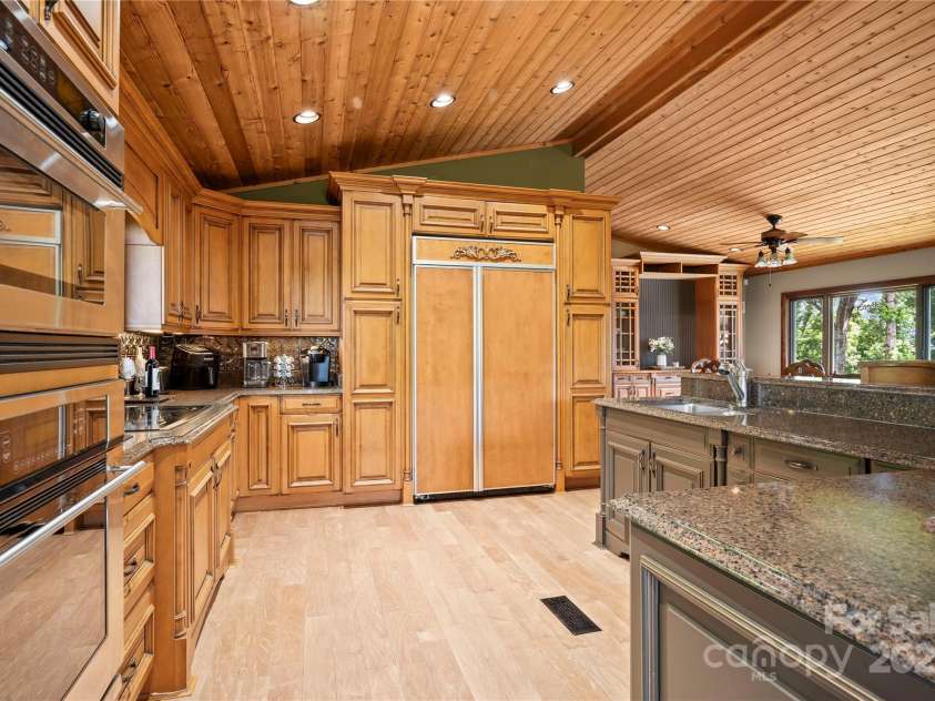 2045 Hogback Mountain Road, Tryon, NC 28782.  MLS# CAR4272415, YatesRealty ID 27598. Kitchen Custom Cabinets Upper Level
