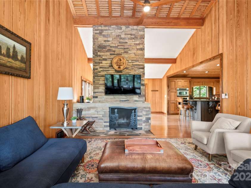 2045 Hogback Mountain Road, Tryon, NC 28782.  MLS# CAR4272415, YatesRealty ID 27598. Living RoomUpper Level