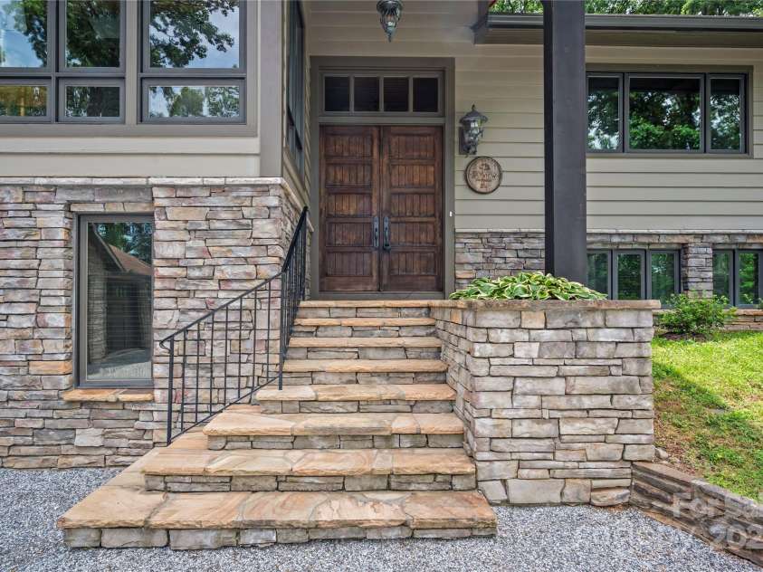 2045 Hogback Mountain Road, Tryon, NC 28782.  MLS# CAR4272415, YatesRealty ID 27598. Maegistic Front Door