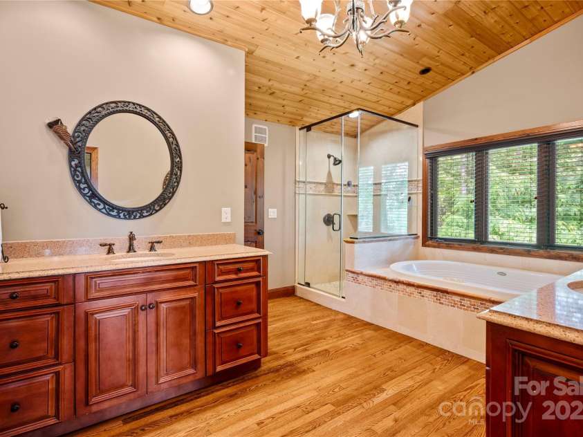 2045 Hogback Mountain Road, Tryon, NC 28782.  MLS# CAR4272415, YatesRealty ID 27598. Primary BTHUpper Level
