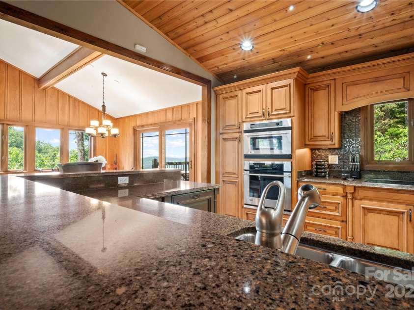 2045 Hogback Mountain Road, Tryon, NC 28782.  MLS# CAR4272415, YatesRealty ID 27598. Quartz CountertopsUpper Level