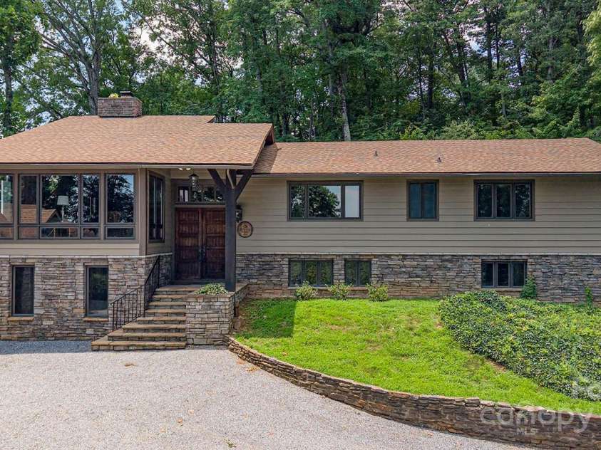 2045 Hogback Mountain Road, Tryon, NC 28782.  MLS# CAR4272415, YatesRealty ID 27598. Split Level