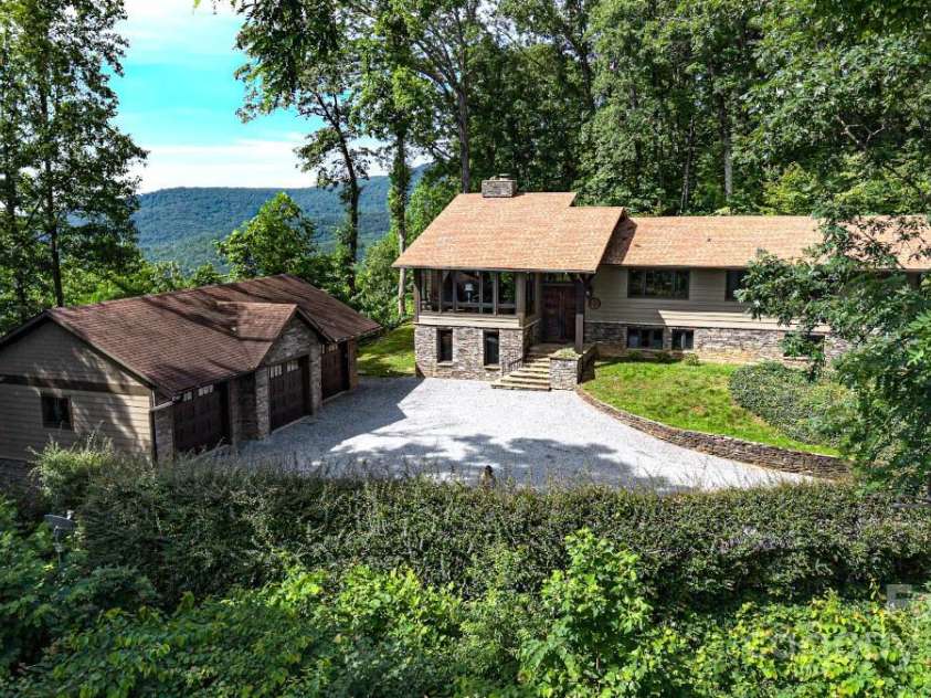 2045 Hogback Mountain Road, Tryon, NC 28782.  MLS# CAR4272415, YatesRealty ID 27598. Stellar Mountain Home