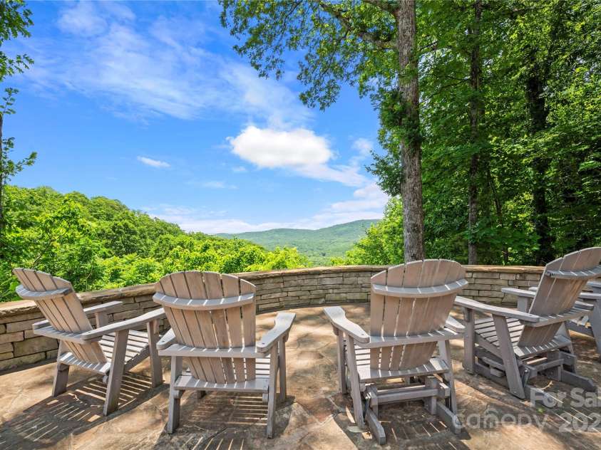 2045 Hogback Mountain Road, Tryon, NC 28782.  MLS# CAR4272415, YatesRealty ID 27598. Stunning Back Terrace