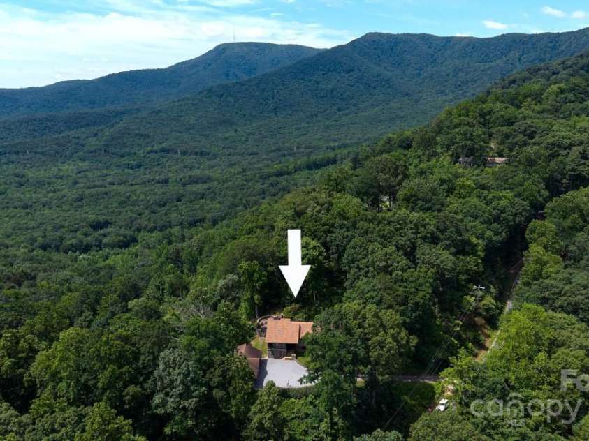 2045 Hogback Mountain Road, Tryon, NC 28782.  MLS# CAR4272415, YatesRealty ID 27598. Stunning Year Round Mountain Views!