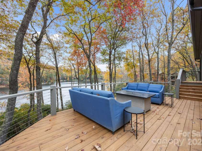95 Cardinal Trace, Lake Toxaway, NC 28747.  MLS# CAR4317545, YatesRealty ID 27603. Firepit Deck