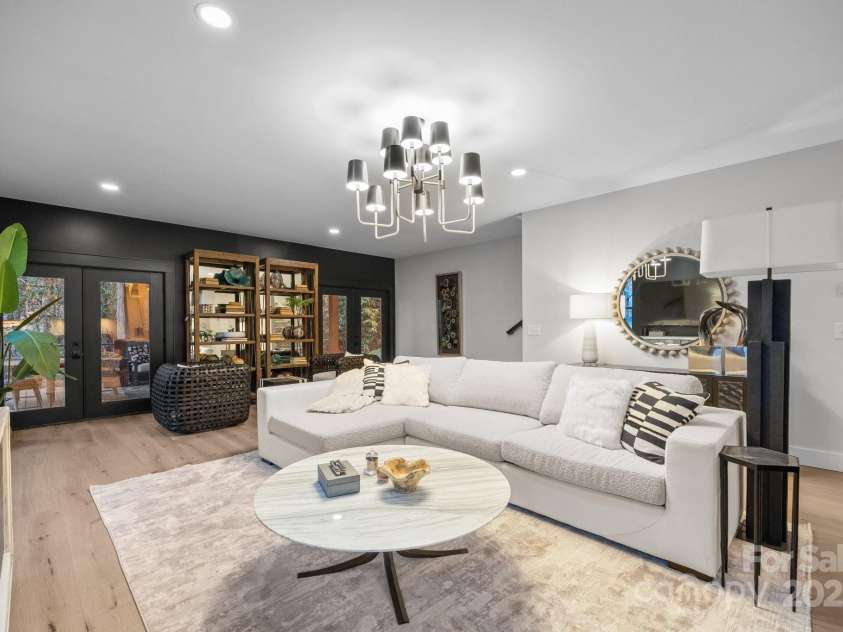 95 Cardinal Trace, Lake Toxaway, NC 28747.  MLS# CAR4317545, YatesRealty ID 27603. Lower Level Family Rm