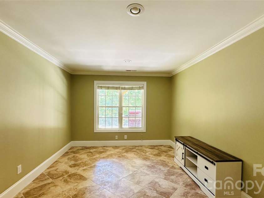 9220 Holly Hill Farm Road, Charlotte, NC 28277.  MLS# CAR4388039, YatesRealty ID 27610. Basement Bedroom