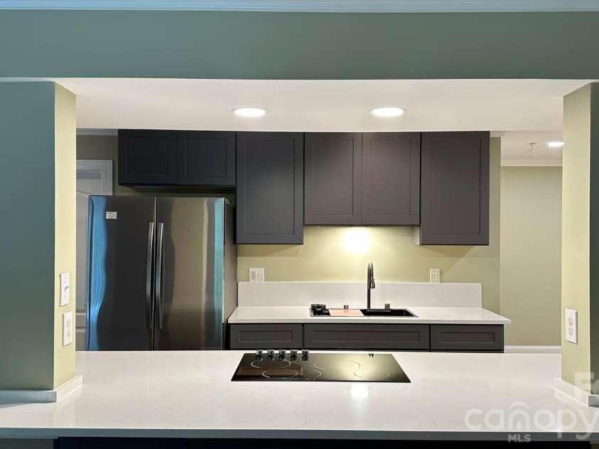 9220 Holly Hill Farm Road, Charlotte, NC 28277.  MLS# CAR4388039, YatesRealty ID 27610. Basement Kitchen Island