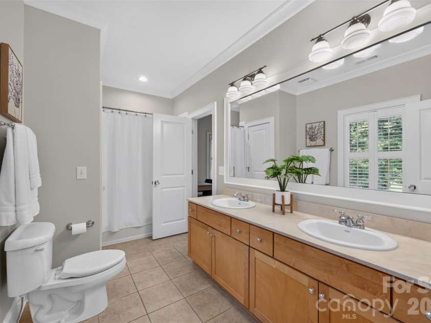 137 Brockton Lane, Mooresville, NC 28117.  MLS# CAR4361731, YatesRealty ID 27611. Large bath between bed 2 and 3