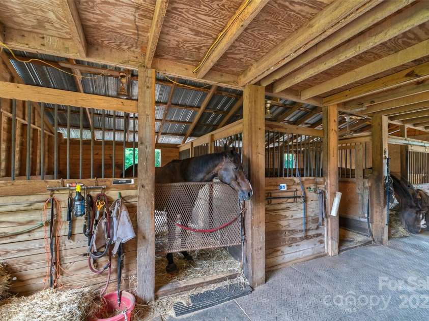 7411 Davis Road, Waxhaw, NC 28173.  MLS# CAR4278062, YatesRealty ID 27614. 7 STALL BARN WITH 12X12 STALLS, CENTER AISLE AND FEED ROOM