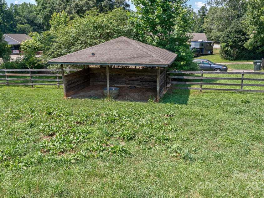 7411 Davis Road, Waxhaw, NC 28173.  MLS# CAR4278062, YatesRealty ID 27614. ONE OF TWO LARGE RUN IN SHEDS