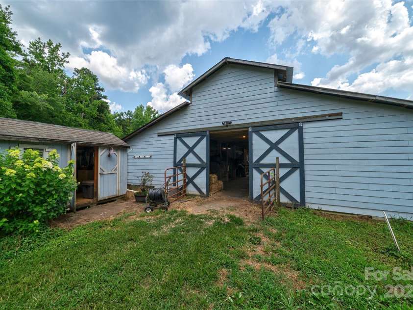 7411 Davis Road, Waxhaw, NC 28173.  MLS# CAR4278062, YatesRealty ID 27614. REAR OF BARN  sEPERATE TACK ROOM