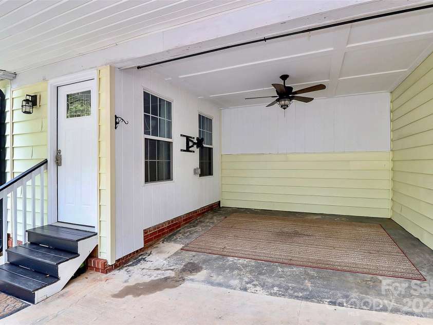 584 Allison Street, Concord, NC 28025.  MLS# CAR4281983, YatesRealty ID 27615. Covered Porch Area