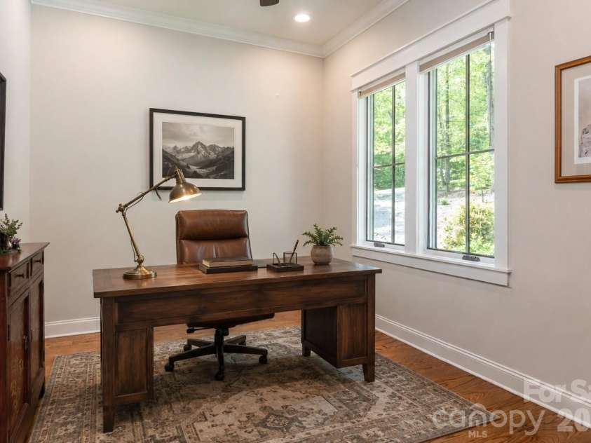 587 Autumn Sky Drive, Hendersonville, NC 28792.  MLS# CAR4364396, YatesRealty ID 27616. The den or home office that has been virtually staged.
