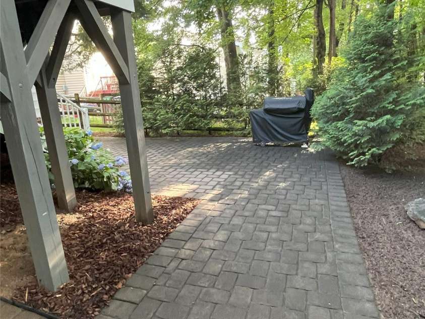 5929 Waterelm Lane, Charlotte, NC 28269.  MLS# CAR4264199, YatesRealty ID 27628. Backyard Pavers 1