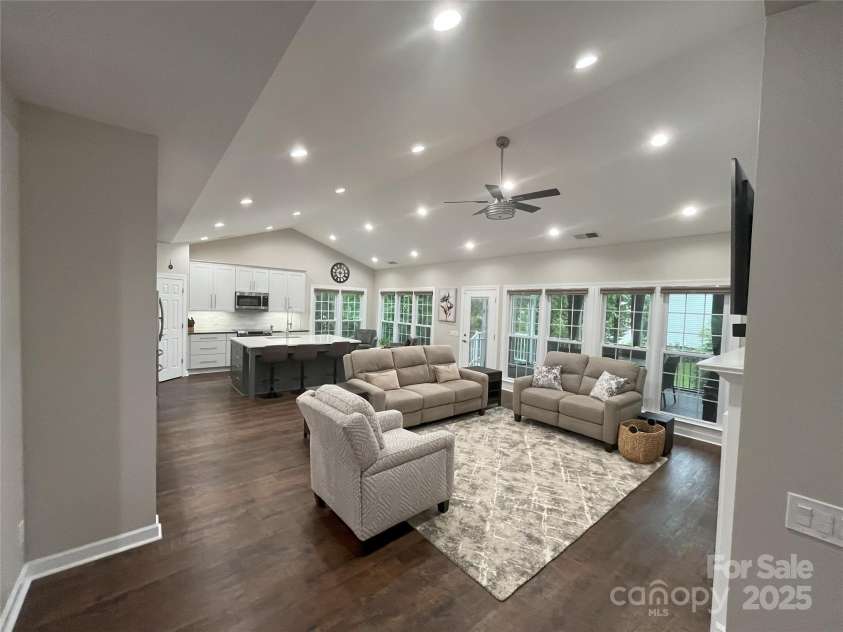 5929 Waterelm Lane, Charlotte, NC 28269.  MLS# CAR4264199, YatesRealty ID 27628. Living Room Angle