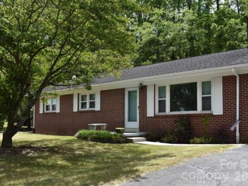 83 Honeysuckle Lane, Burnsville, NC 28714.  MLS# CAR4377930, YatesRealty ID 27630. Charming entry