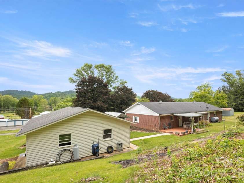 83 Honeysuckle Lane, Burnsville, NC 28714.  MLS# CAR4377930, YatesRealty ID 27630. Detached heated workshop with electricity