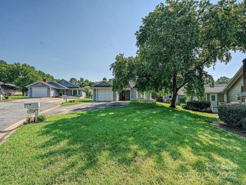 2912 Peachwood Court, Fort Mill, SC 29715.  MLS# CAR4276302, YatesRealty ID 27631. Driveway and Front of House