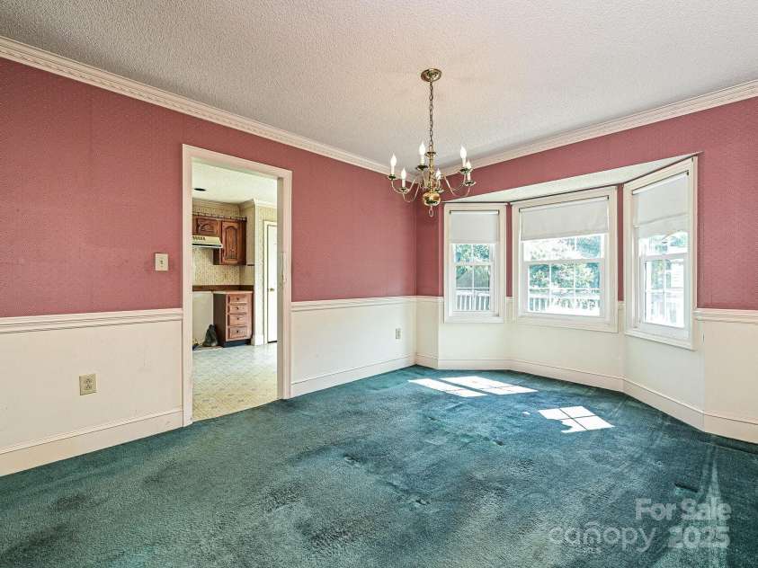 2912 Peachwood Court, Fort Mill, SC 29715.  MLS# CAR4276302, YatesRealty ID 27631. Formal Dining Room Leading To Kitchen