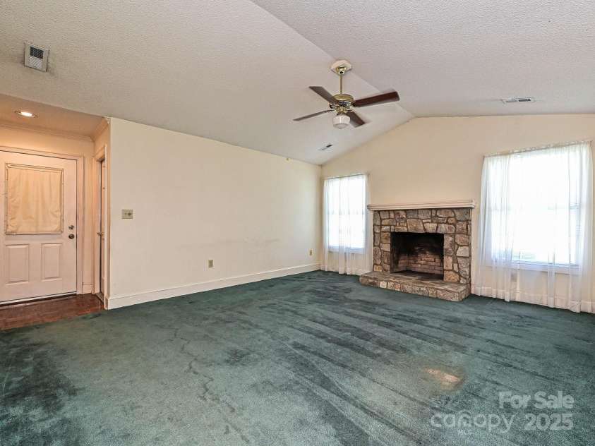 2912 Peachwood Court, Fort Mill, SC 29715.  MLS# CAR4276302, YatesRealty ID 27631. Living Room Fireplace