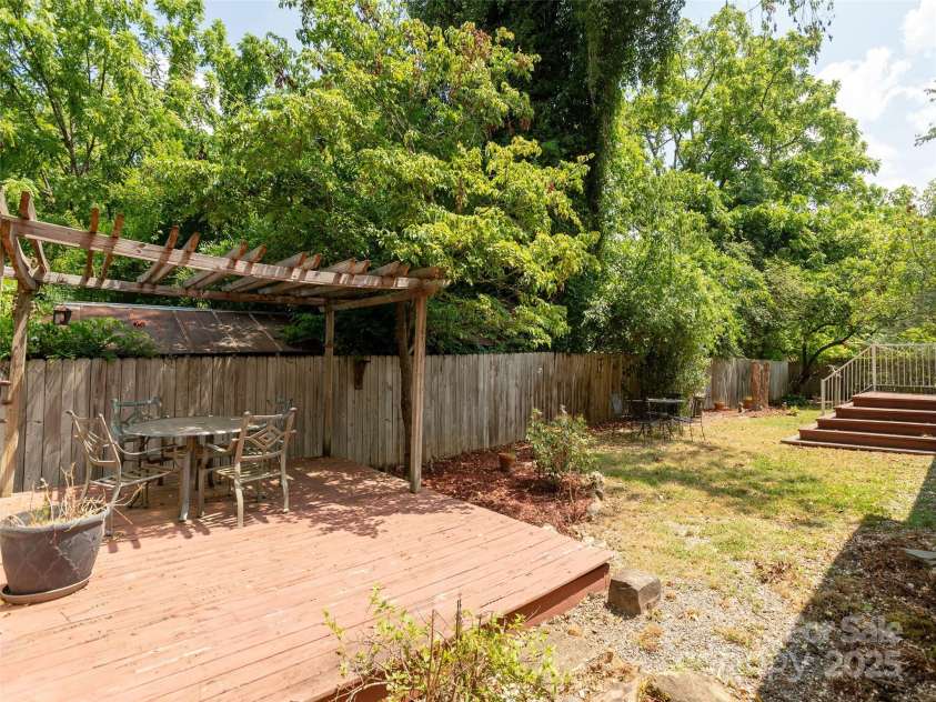 304 Old Haw Creek Road, Asheville, NC 28805.  MLS# CAR4275687, YatesRealty ID 27634. Fenced backyard with 2 decks