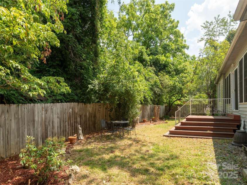 304 Old Haw Creek Road, Asheville, NC 28805.  MLS# CAR4275687, YatesRealty ID 27634. Fenced backyard with 2 decks