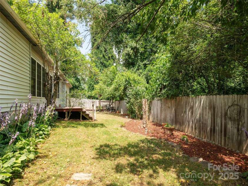304 Old Haw Creek Road, Asheville, NC 28805.  MLS# CAR4275687, YatesRealty ID 27634. Fenced backyard with 2 decks