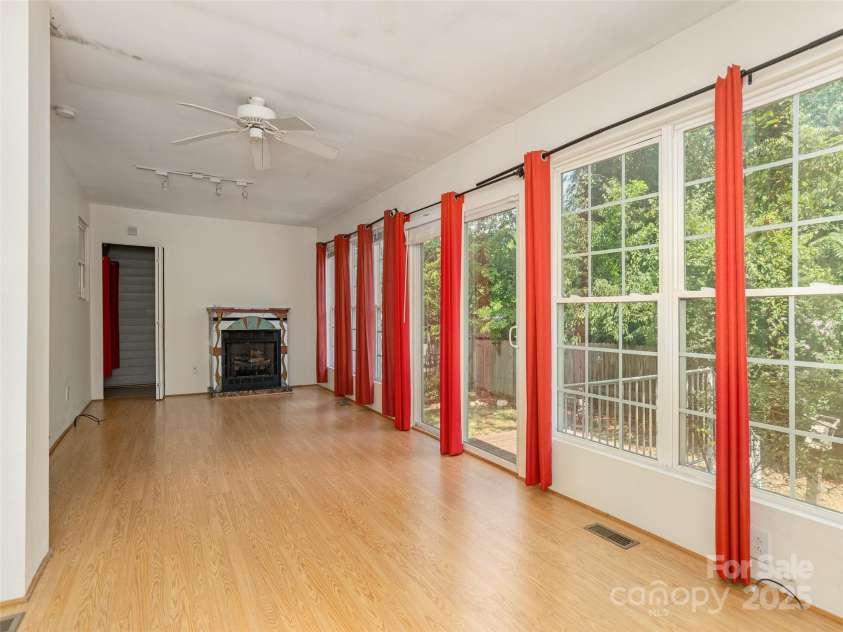 304 Old Haw Creek Road, Asheville, NC 28805.  MLS# CAR4275687, YatesRealty ID 27634. Spacious Sunroom