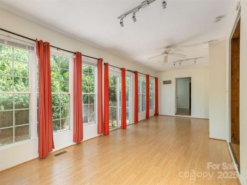 304 Old Haw Creek Road, Asheville, NC 28805.  MLS# CAR4275687, YatesRealty ID 27634. Spacious Sunroom