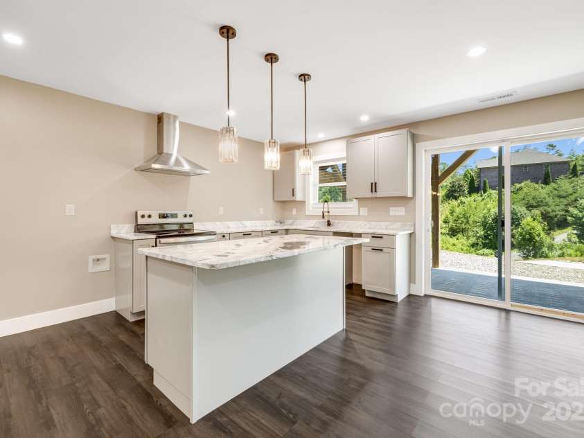 115 Nader Avenue, Weaverville, NC 28787.  MLS# CAR4282051, YatesRealty ID 27638. DOWNSTAIRS KITCHEN
