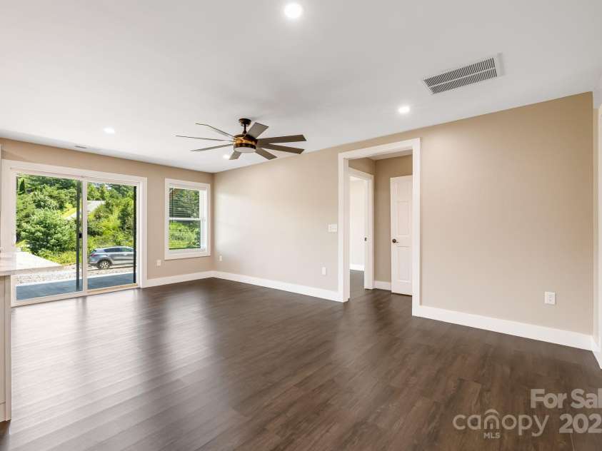 115 Nader Avenue, Weaverville, NC 28787.  MLS# CAR4282051, YatesRealty ID 27638. DOWNSTAIRS LIVING AREA