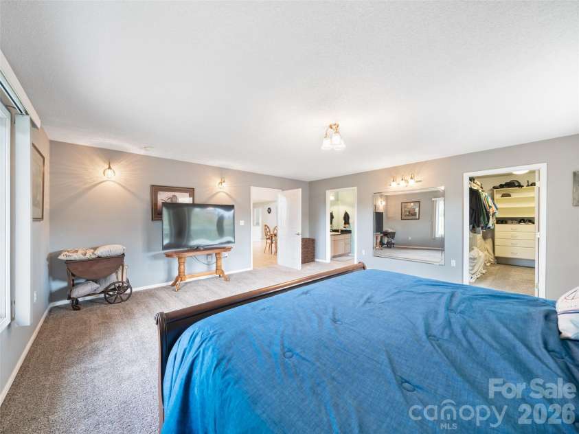 124 Dogwood Circle, Burnsville, NC 28714.  MLS# CAR4290145, YatesRealty ID 2764. Outer Walls  of primary have sound proofing within wall to buffer noise from great room