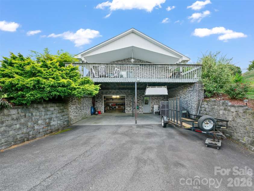 124 Dogwood Circle, Burnsville, NC 28714.  MLS# CAR4290145, YatesRealty ID 2764. Partially Covered Deck  for storing Boats or ATVs