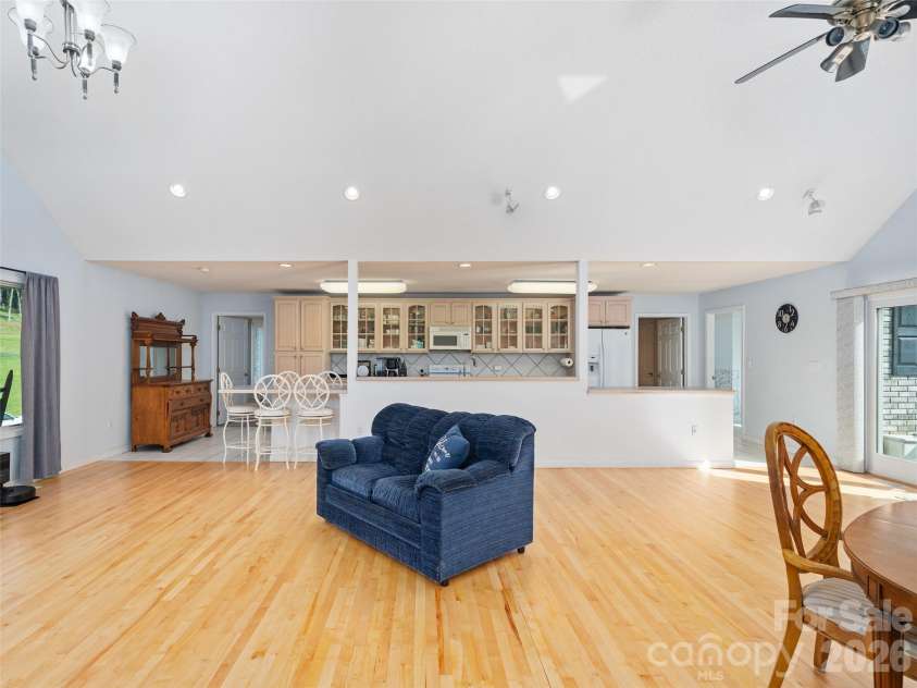 124 Dogwood Circle, Burnsville, NC 28714.  MLS# CAR4290145, YatesRealty ID 2764. Wide counter tops act as a divider between kichen area and great room
