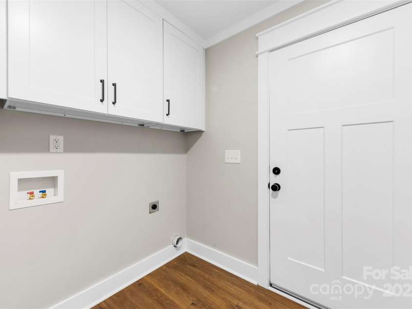 6788 Clyde Wehunt Road, Cherryville, NC 28021.  MLS# CAR4283627, YatesRealty ID 27642. Laundry room