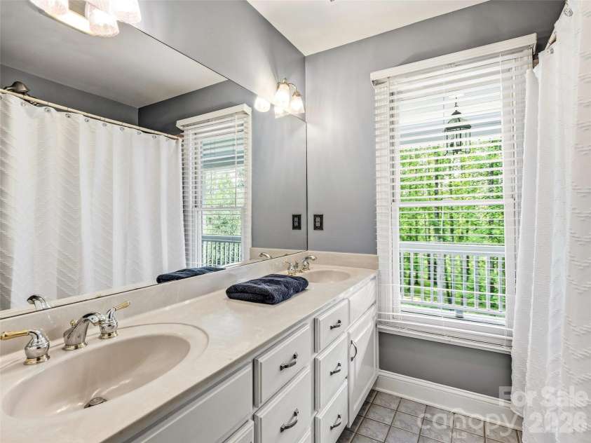 243 Poplar Lane, Pisgah Forest, NC 28712.  MLS# CAR4386955, YatesRealty ID 27648. Full bath upper level there are 3 on this level