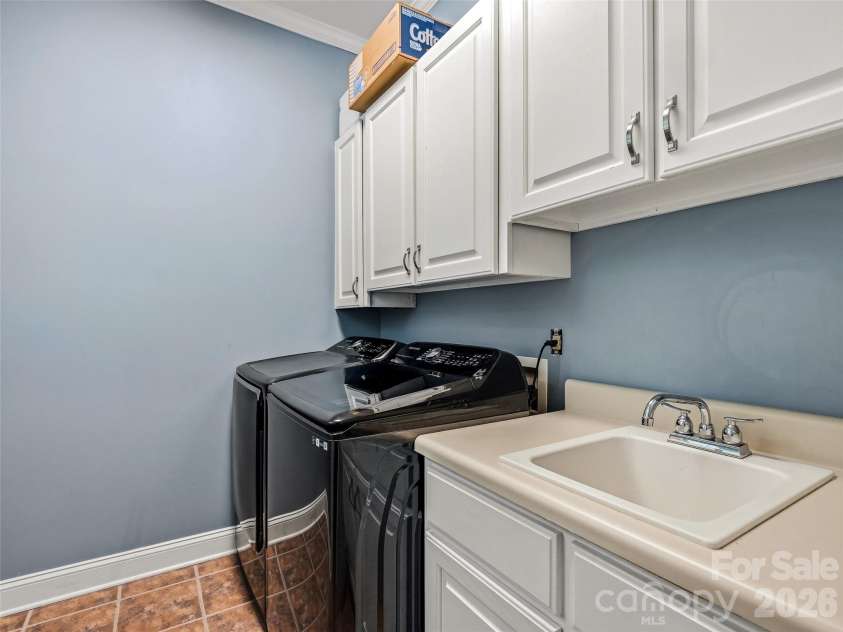 243 Poplar Lane, Pisgah Forest, NC 28712.  MLS# CAR4386955, YatesRealty ID 27648. Laundry main level, second laundry hook up in basement