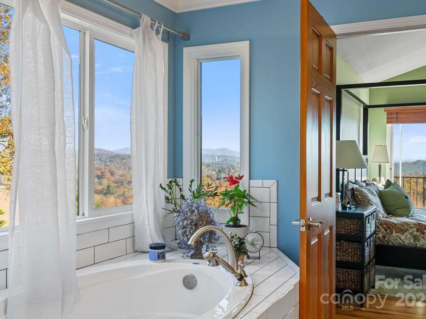 235 Windwhisper Drive, Asheville, NC 28804.  MLS# CAR4330019, YatesRealty ID 2765. 