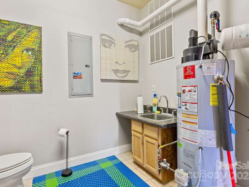 235 Windwhisper Drive, Asheville, NC 28804.  MLS# CAR4330019, YatesRealty ID 2765. 