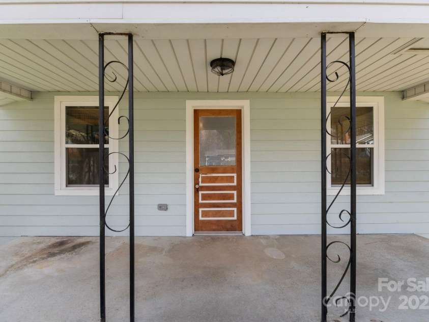 452 Old Hendersonville Highway, Brevard, NC 28712.  MLS# CAR4226407, YatesRealty ID 27652. Step onto this inviting front porch and feel right at home!