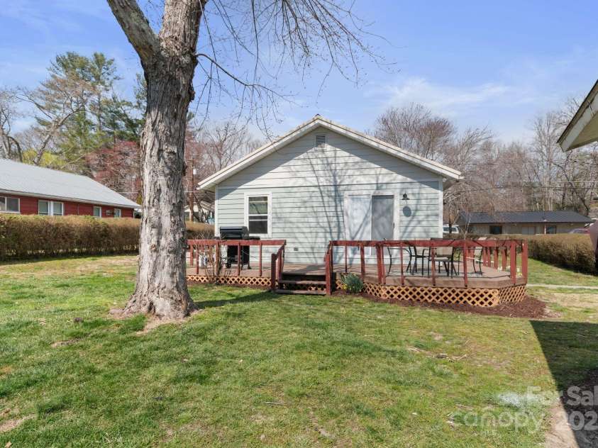 452 Old Hendersonville Highway, Brevard, NC 28712.  MLS# CAR4226407, YatesRealty ID 27652. The level .30-acre lot provides plenty of space with minimal upkeep