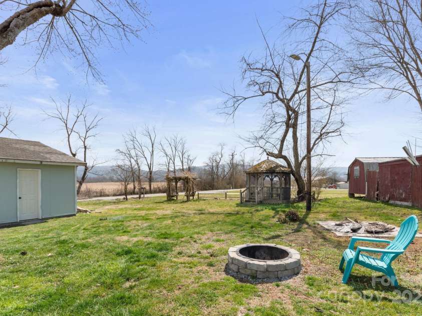452 Old Hendersonville Highway, Brevard, NC 28712.  MLS# CAR4226407, YatesRealty ID 27652. Transform this versatile yard into your personal oasis
