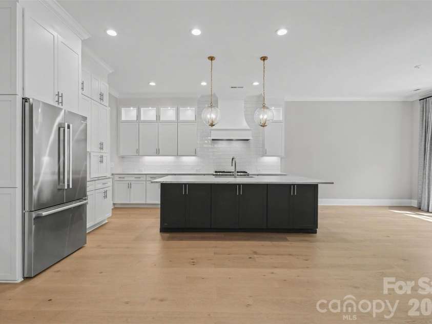 119 Thorncote Place, Charlotte, NC 28226.  MLS# CAR4327053, YatesRealty ID 27654. Open plan kitchen dining living